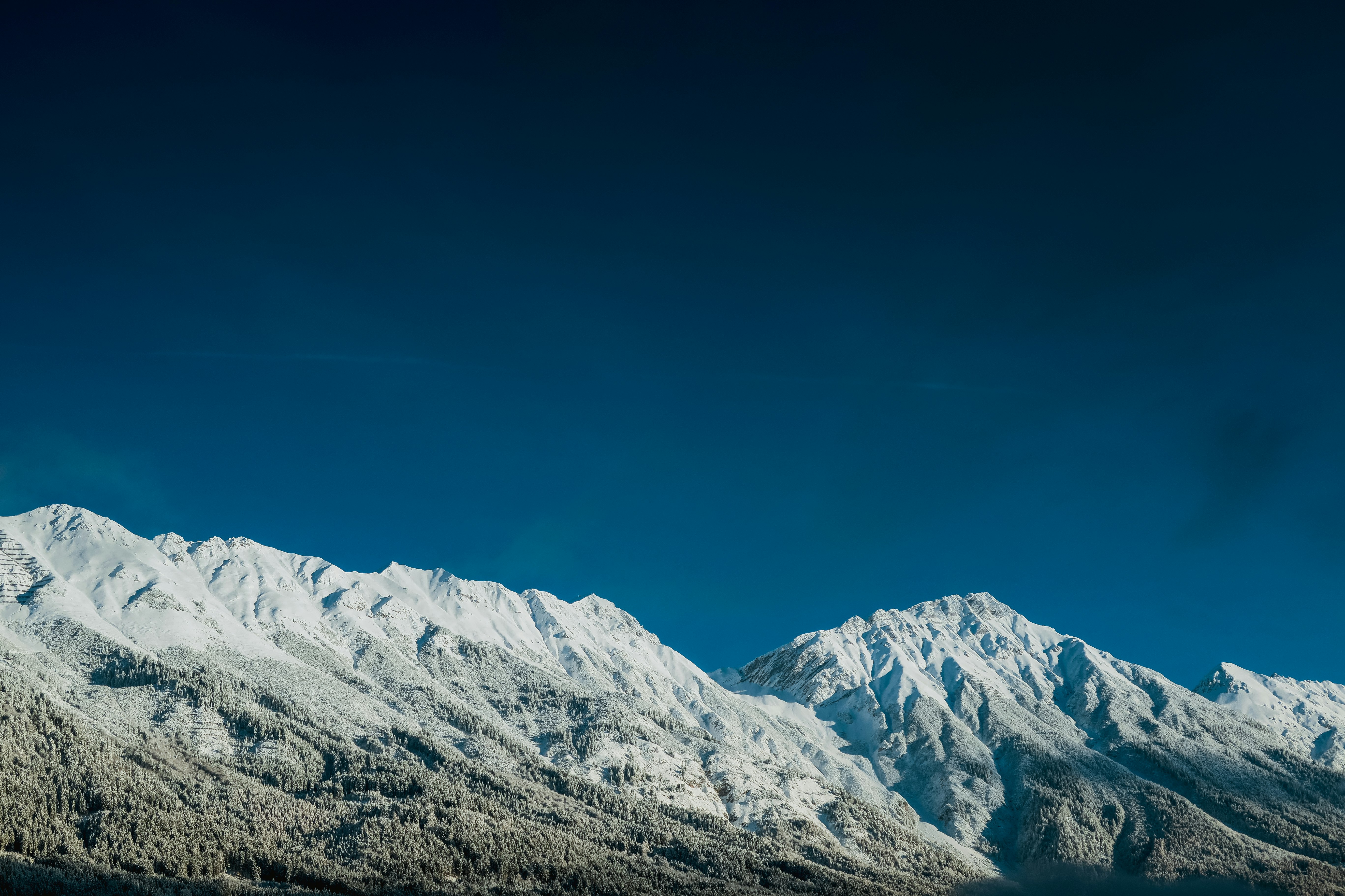 aerial view of snowy mountain peaks